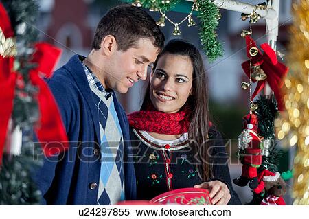 couple in christmas View Large Photo Image Stock Photography - couple in christmas. Fotosearch