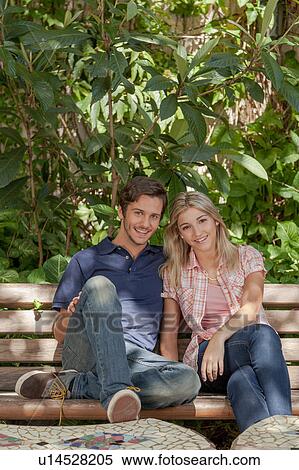 Stock Photography - couple in love in the park. Fotosearch