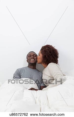 Couple in love kissing View Large Photo Image Stock Image - Couple in love kissing. Fotosearch