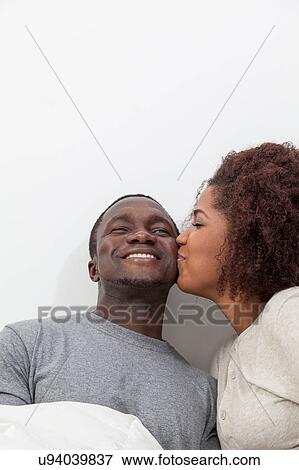 Couple in love kissing View Large Photo Image Stock Photo - Couple in love kissing. Fotosearch