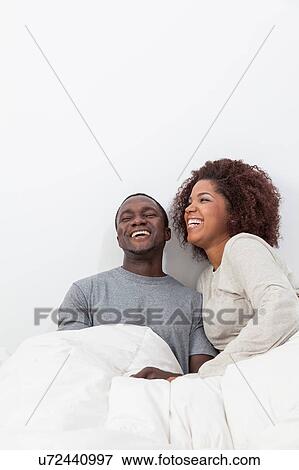 Stock Photo - Couple in love laughin. Fotosearch