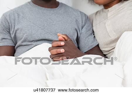 Couple in love looking each other View Large Photo Image Stock Photo - Couple in love looking each other. Fotosearch