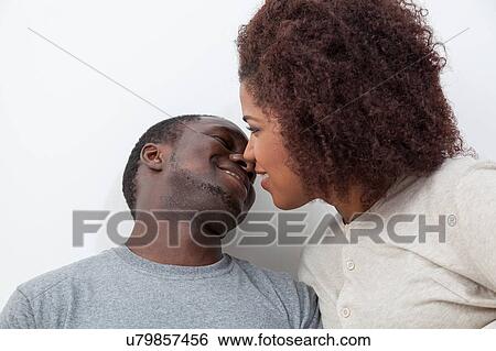 Couple in love looking each other View Large Photo Image Stock Photograph - Couple in love looking each other. Fotosearch