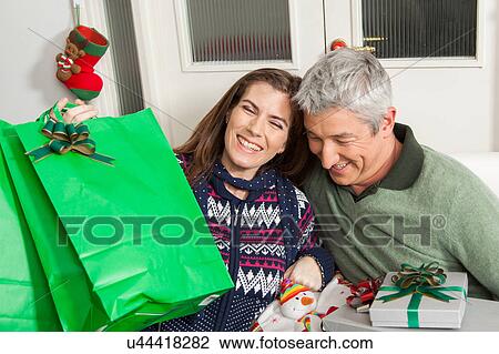 Stock Image - Couple laughing. Fotosearch