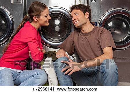 Stock Image - Couple looking at each other. Fotosearch