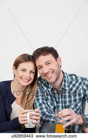 couple smiling in breakfast View Large Photo Image Stock Image - couple smiling in breakfast. Fotosearch