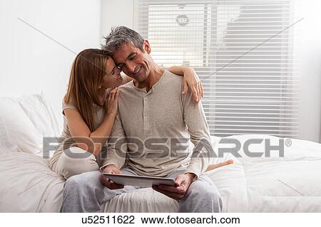 Stock Image - Couple smiling. Fotosearch