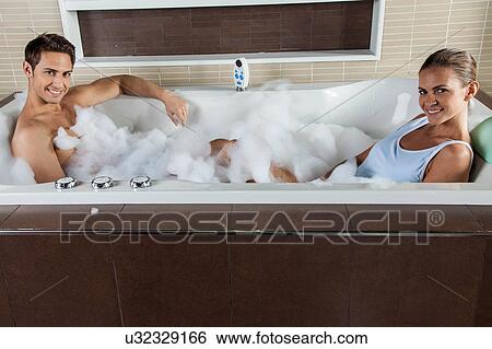 Stock Photograph - couple taking a shower. Fotosearch