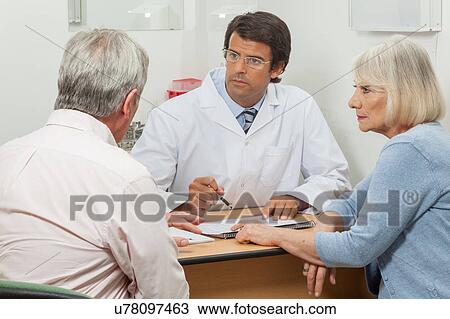 couple visiting the doctor View Large Photo Image Stock Image - couple visiting the doctor. Fotosearch