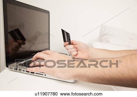 Credit card and computer View Large Photo Image Stock Image - Credit card and computer. Fotosearch