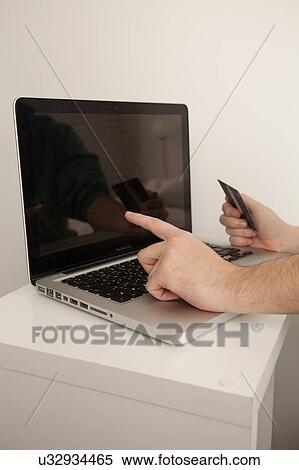 Stock Photography - Credit card and computer. Fotosearch