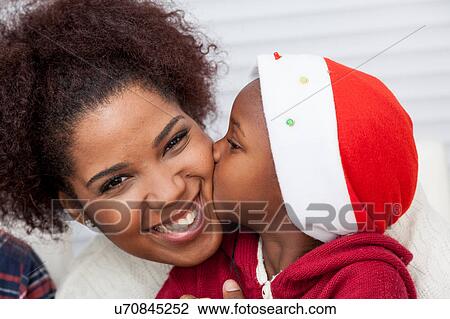 Daughter kissing her mother View Large Photo Image Stock Image - Daughter kissing her mother. Fotosearch