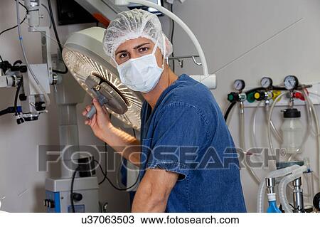 Doctor looking at camera View Large Photo Image Stock Image - Doctor looking at camera. Fotosearch