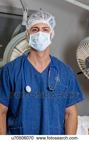 Doctor looking at camera View Large Photo Image Stock Image - Doctor looking at camera. Fotosearch