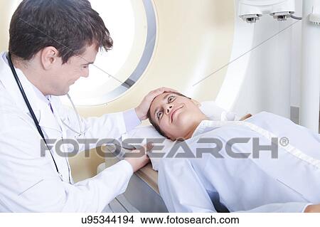 Picture - Doctor made a tomography. Fotosearch