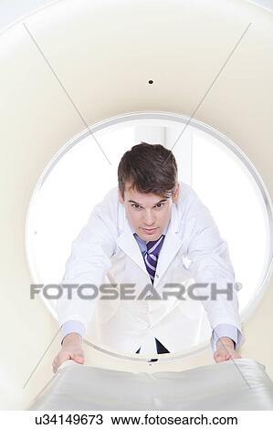 Doctor made a tomography View Large Photo Image Stock Image - Doctor made a tomography. Fotosearch