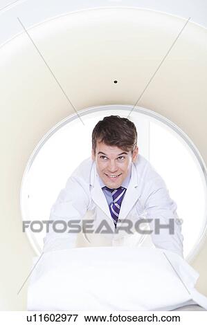 Stock Photo - Doctor made a tomography. Fotosearch
