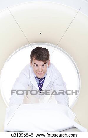 Stock Photograph - Doctor made a tomography. Fotosearch