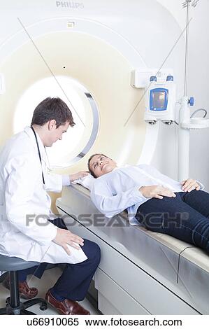 Doctor made a tomography View Large Photo Image Stock Photography - Doctor made a tomography. Fotosearch