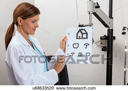 Stock Photo - Doctor showing the chart. Fotosearch