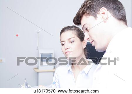 Doctor with a patient View Large Photo Image Stock Image - Doctor with a patient. Fotosearch