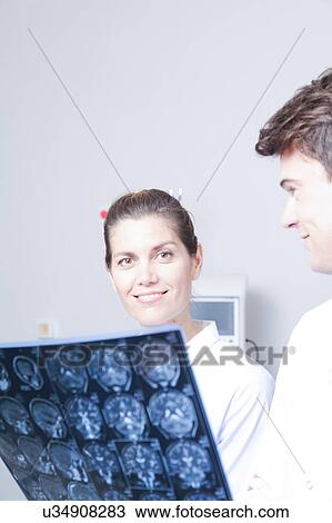 Doctor with a patient View Large Photo Image Stock Image - Doctor with a patient. Fotosearch