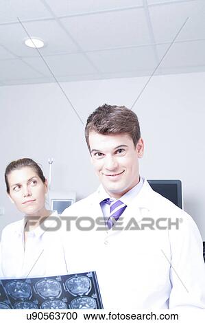 Doctor with a patient View Large Photo Image Stock Image - Doctor with a patient. Fotosearch