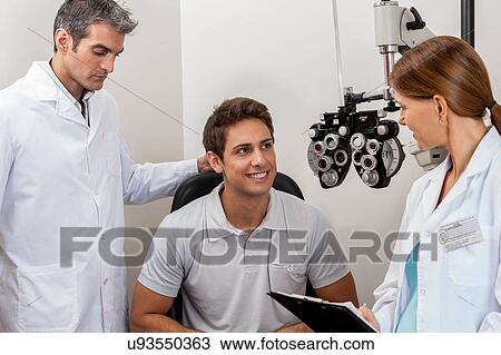 Doctors explaining the results View Large Photo Image Stock Image - Doctors explaining the results. Fotosearch