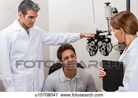 Stock Photo - Doctors explaining the results. Fotosearch