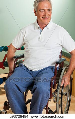 Elder man in a wheelchair View Large Photo Image Picture - Elder man in a wheelchair. Fotosearch