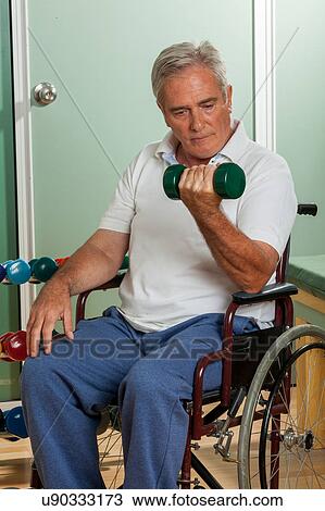 Elder man in a wheelchair View Large Photo Image Stock Image - Elder man in a wheelchair. Fotosearch