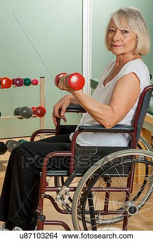 Picture - Elder woman in a wheelchair. Fotosearch