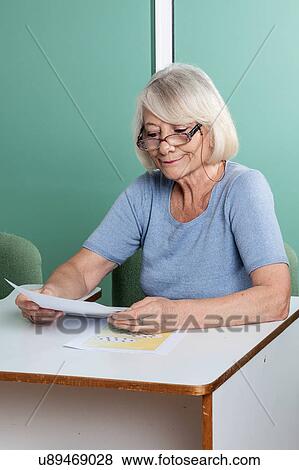 elder woman play games View Large Photo Image Stock Photo - elder woman play games. Fotosearch