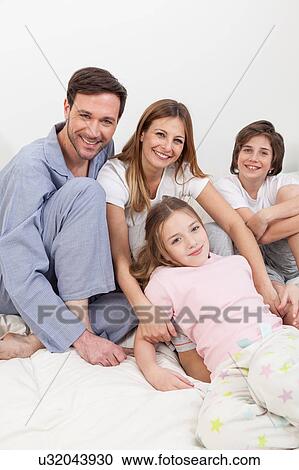Stock Image - Family wake up. Fotosearch