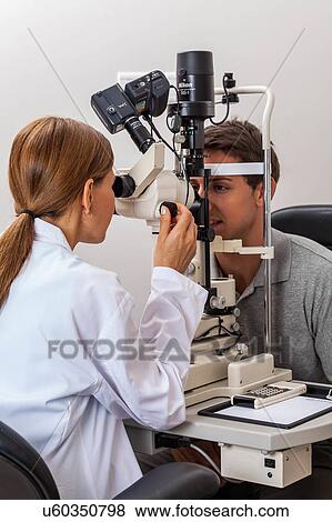 Female doctor examining patient View Large Photo Image Stock Photo - Female doctor examining patient. Fotosearch
