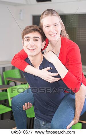 Stock Photo - Friends having fun in the college. Fotosearch