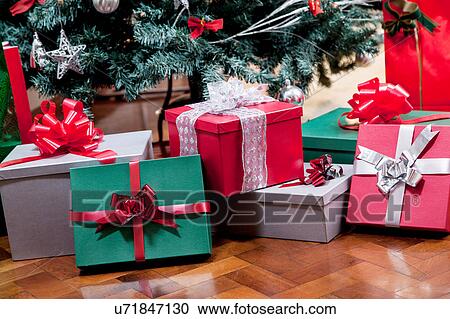 Gifts under the tree View Large Photo Image Stock Image - Gifts under the tree. Fotosearch
