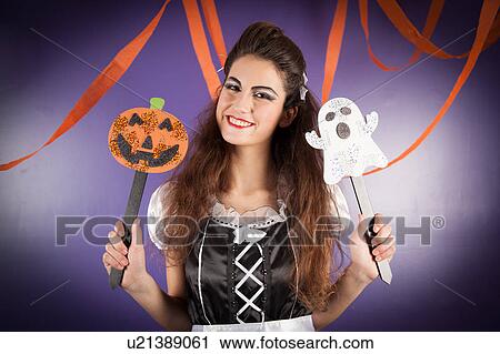 Stock Image - Girl dressed for halloween. Fotosearch