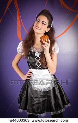 Stock Image - Girl dressed for halloween. Fotosearch