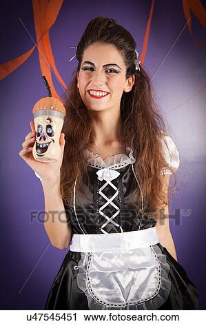 Stock Image - Girl dressed for halloween. Fotosearch