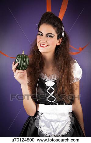 Stock Image - Girl dressed for halloween. Fotosearch