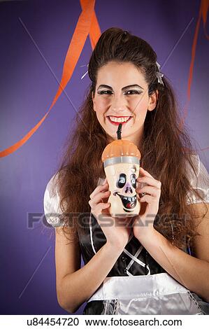 Stock Image - Girl dressed for halloween. Fotosearch