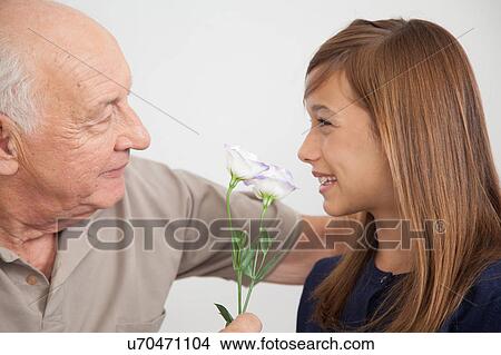 girl having fun with her grandfather View Large Photo Image Picture - girl having fun with her grandfather. Fotosearch