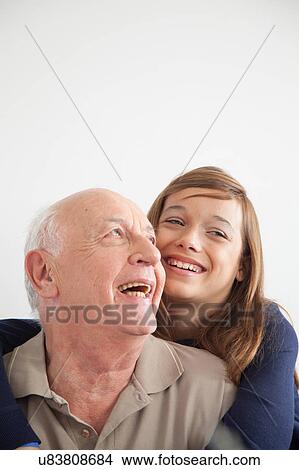girl having fun with her grandfather View Large Photo Image Picture - girl having fun with her grandfather. Fotosearch