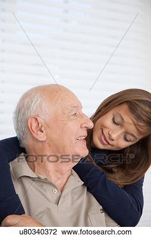 girl having fun with her grandfather View Large Photo Image Stock Image - girl having fun with her grandfather. Fotosearch