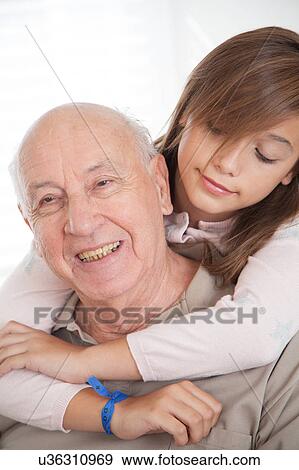 girl having fun with her grandfather View Large Photo Image Stock Photo - girl having fun with her grandfather. Fotosearch