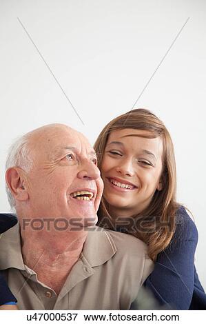 girl having fun with her grandfather View Large Photo Image Stock Photo - girl having fun with her grandfather. Fotosearch