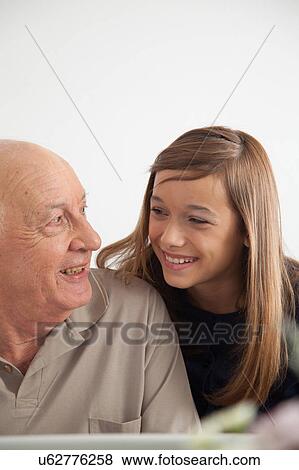 girl having fun with her grandfather View Large Photo Image Stock Photo - girl having fun with her grandfather. Fotosearch