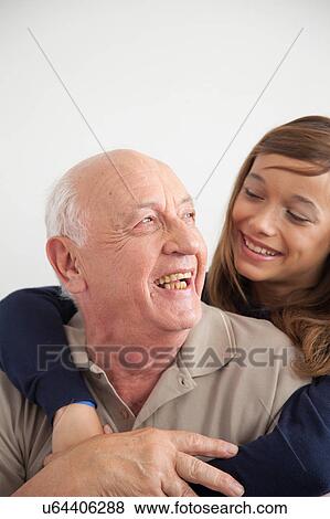 girl having fun with her grandfather View Large Photo Image Stock Photo - girl having fun with her grandfather. Fotosearch