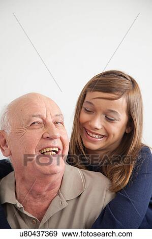 girl having fun with her grandfather View Large Photo Image Stock Photo - girl having fun with her grandfather. Fotosearch
